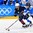 GANGNEUNG, SOUTH KOREA - FEBRUARY 19: USA's Emily Pfalzer #8 and Finland's Michelle Karvinen #33 chase down a loose puck during semifinal round action at the PyeongChang 2018 Olympic Winter Games. (Photo by Matt Zambonin/HHOF-IIHF Images)

